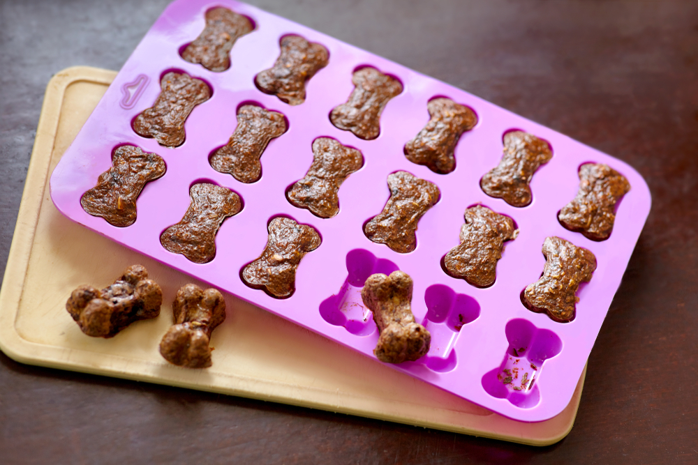 A tray of homemade dog treats that you can make this Thanksgiving for your new puppy.